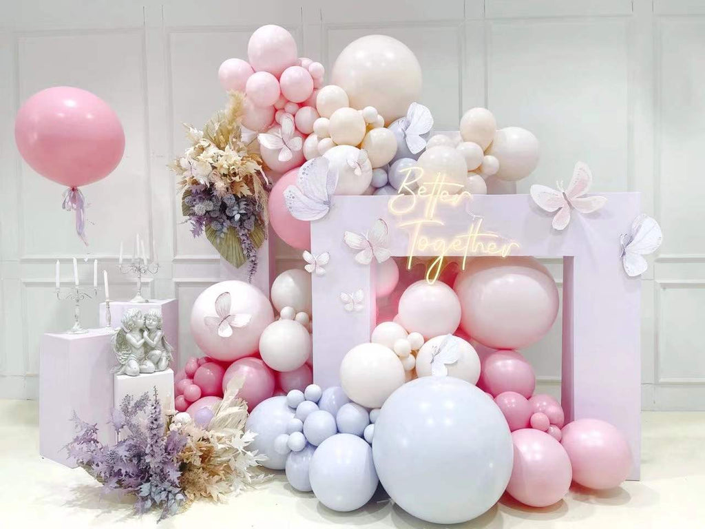 A fairy-filled warm colour party balloon scheme